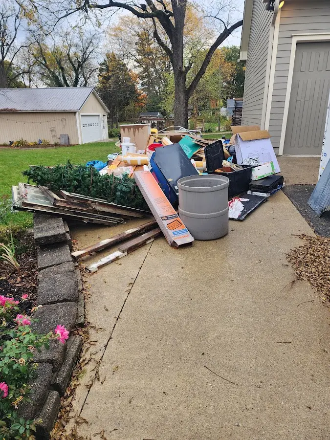 Dumpster being loaded with debris for 30 Yard Dumpster Rental in North Syracuse